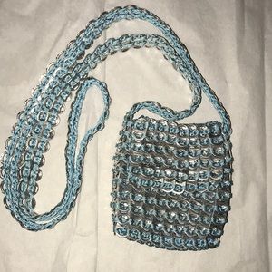 Cute, unique bottle cap cross body bag.
